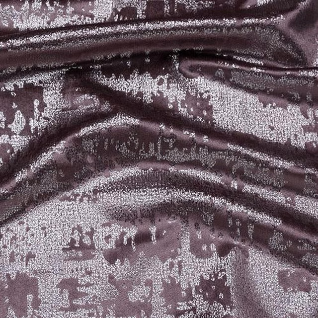 Close-up of Mercury Mauve fabric with smoky plum ground and silvery mauve abstract pattern