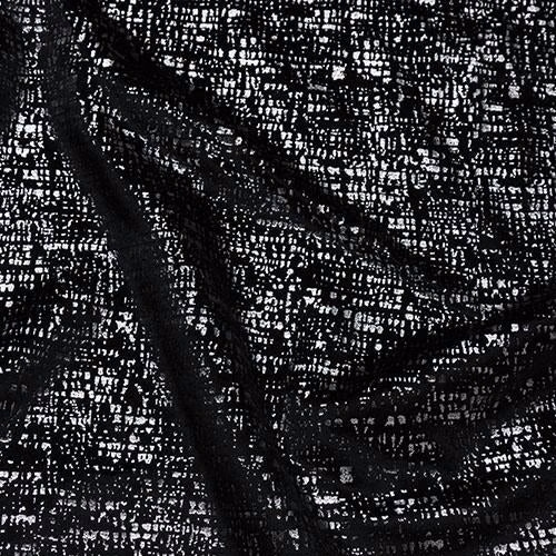 Black speckled woven fabric with white flecks and a textured finish