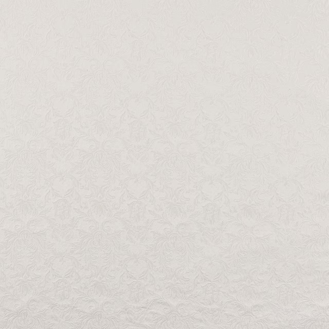 Pale ivory floral fabric with a subtle raised woven texture
