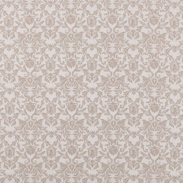Soft beige damask fabric with repeating ornate floral motif on a pale ground