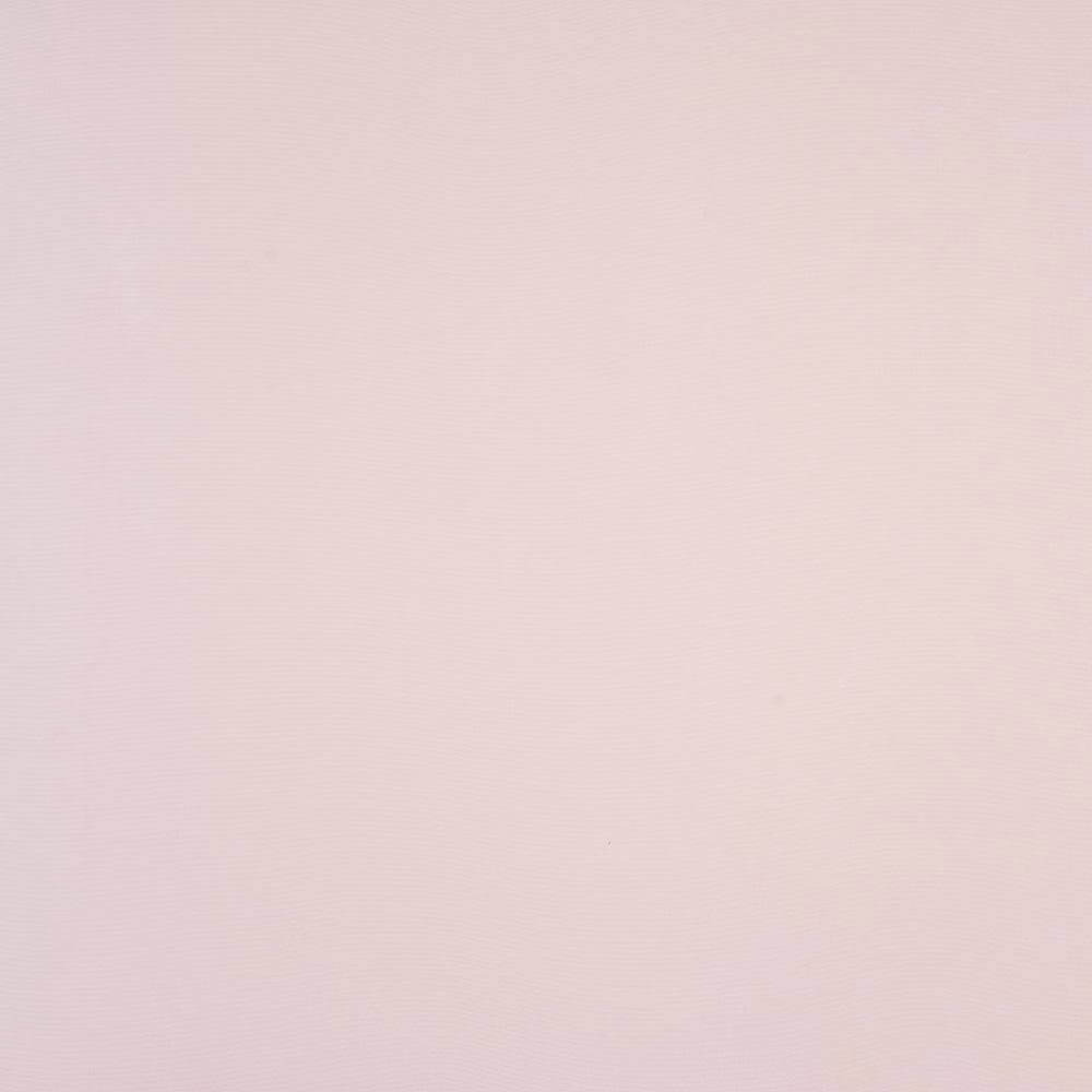 Pale blush pink plain-woven cotton fabric with a soft matte finish