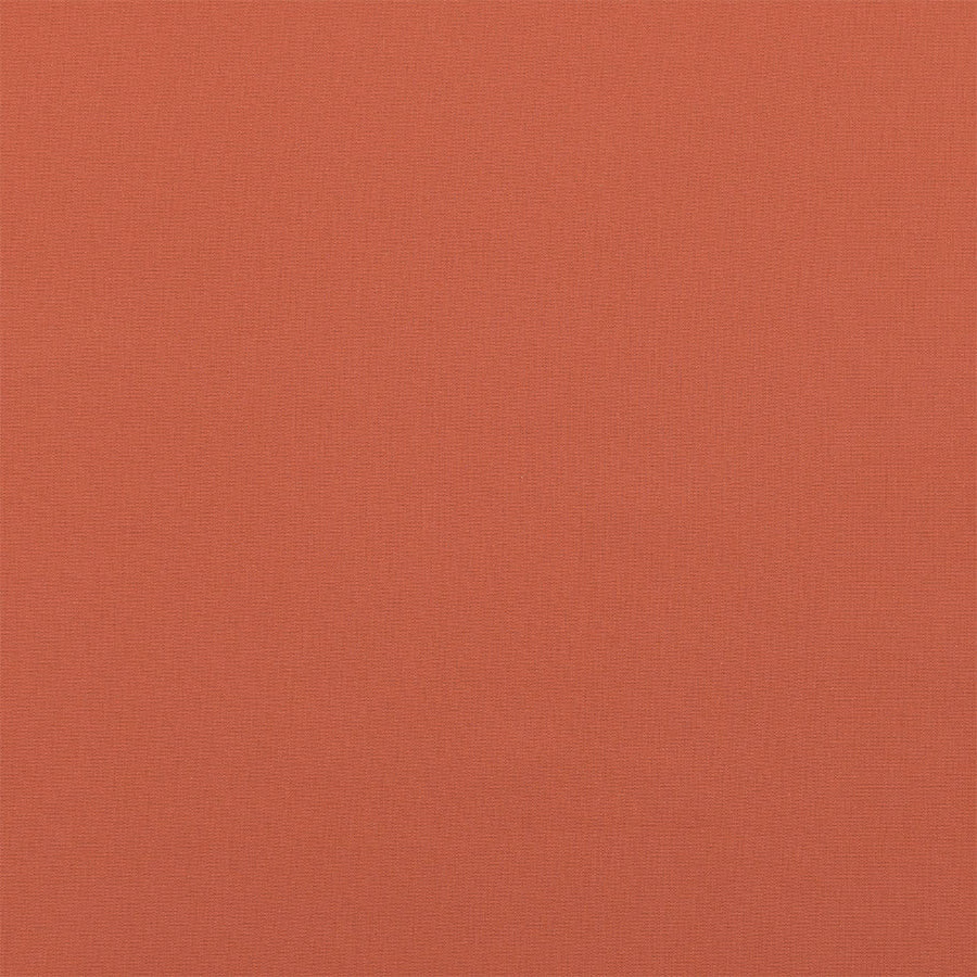 Burnt sienna plain woven cotton swatch with a fine matte texture