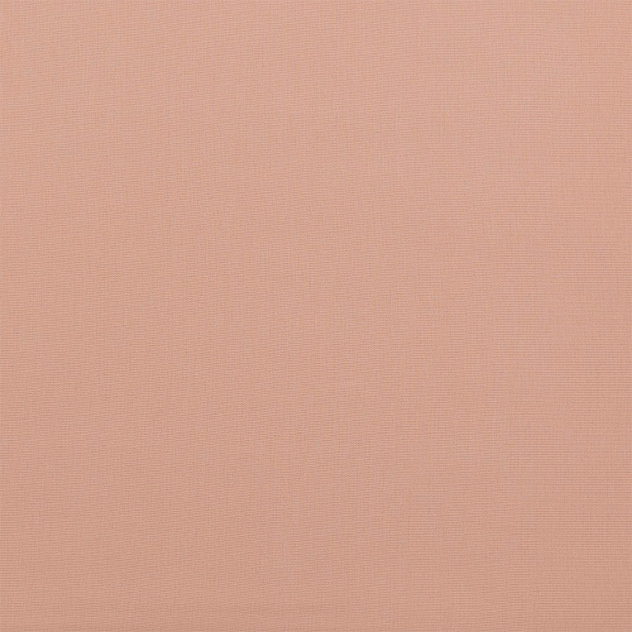 Soft dusky blush pink woven cotton fabric with a fine textured surface