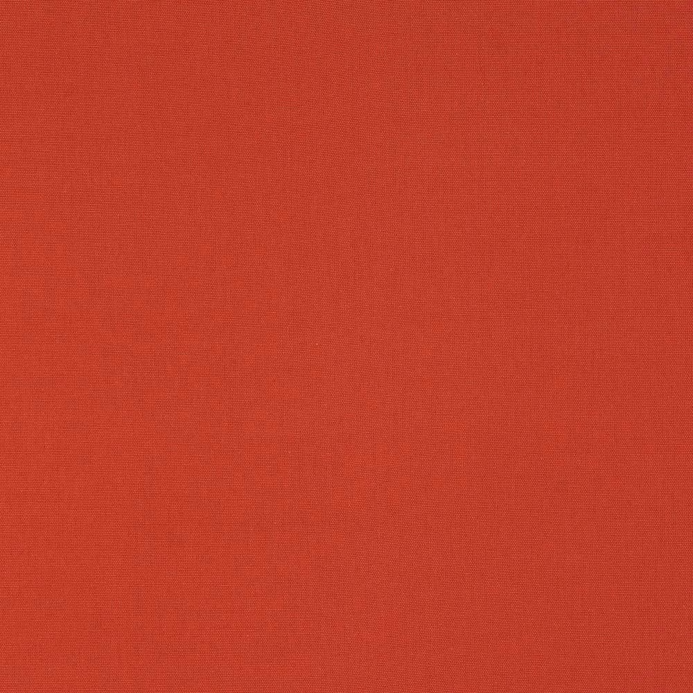 Close-up of warm grapefruit coral plain-weave cotton fabric