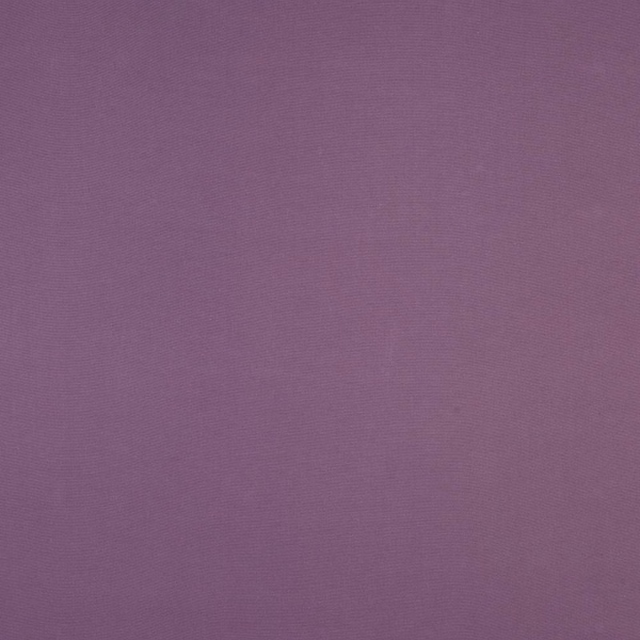Close-up of muted heather purple plain-woven cotton fabric with a fine texture.