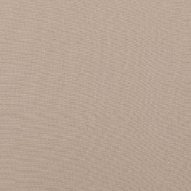 Close-up of soft beige woven cotton fabric with a fine hessian texture