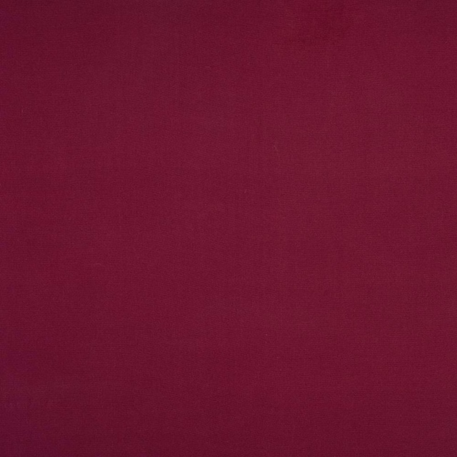 Deep mulberry plum plain-woven cotton fabric swatch with a smooth matt texture