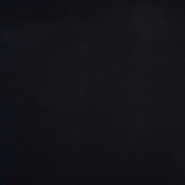 Deep charcoal black plain-woven cotton fabric swatch with matte texture