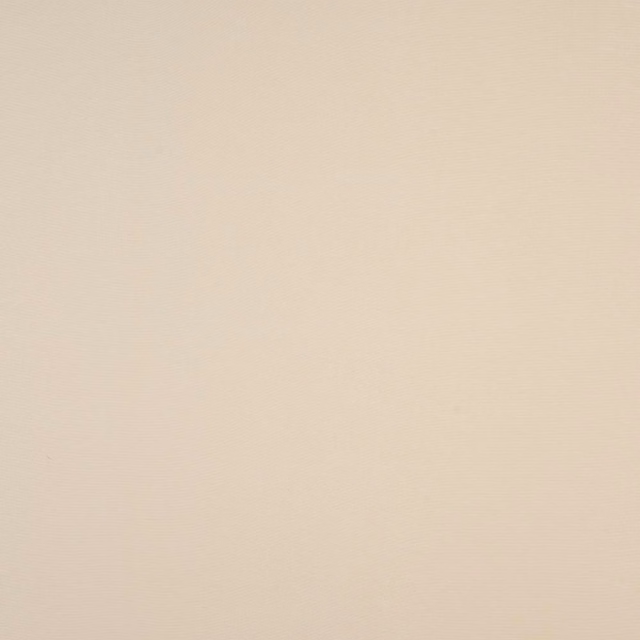 Plain soft oatmeal cream cotton fabric swatch with fine woven texture