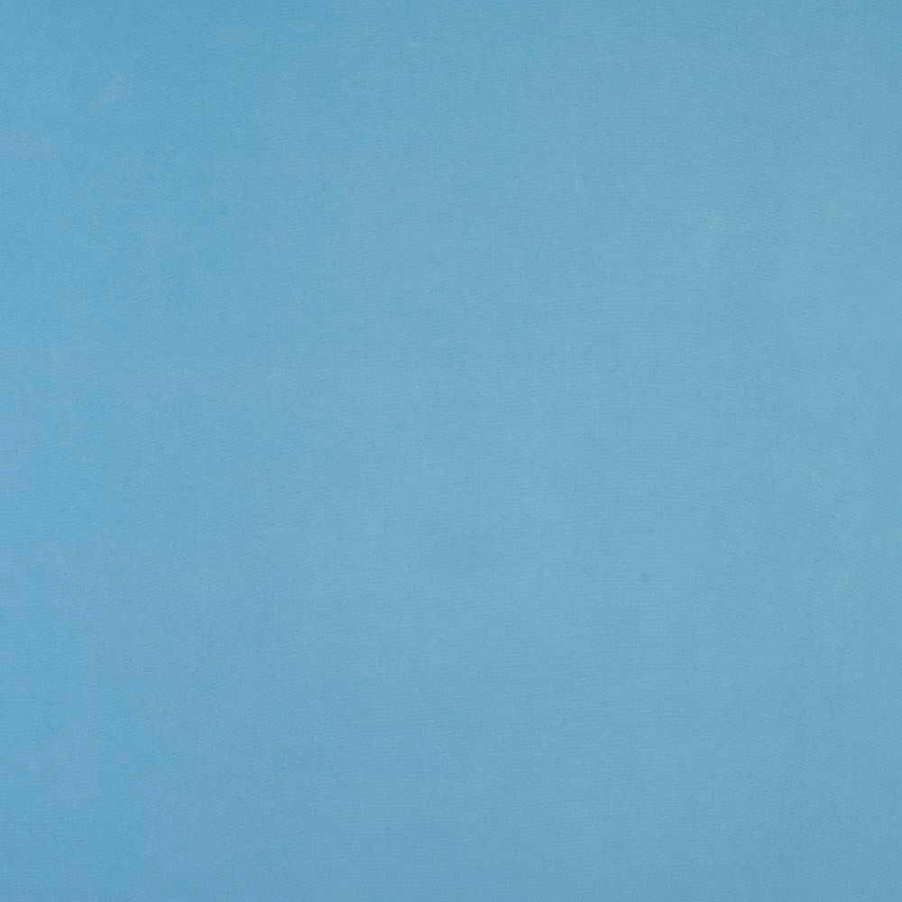 Soft sky blue plain cotton fabric with fine diagonal weave texture