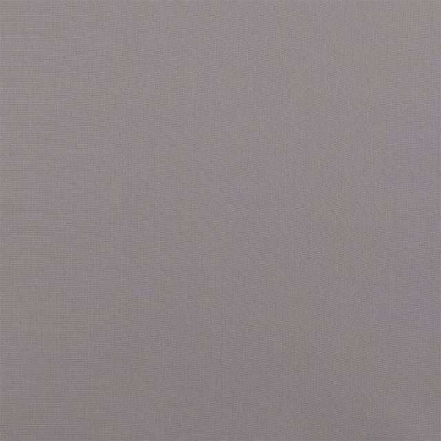 Close-up of a plain zinc-grey woven cotton fabric with a fine texture