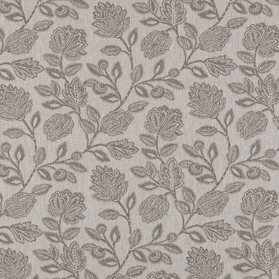 Close-up of dove grey floral vine fabric on a pale woven ground