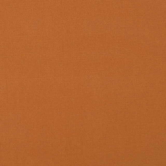 Burnt orange plain woven cotton swatch with fine horizontal texture