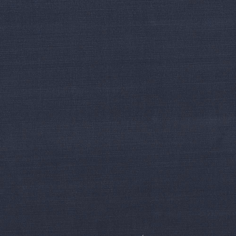 Close-up of deep navy cotton fabric with a fine, even weave