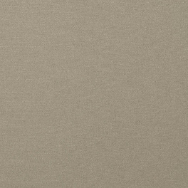 Close-up of plain soft putty beige cotton fabric with fine woven texture