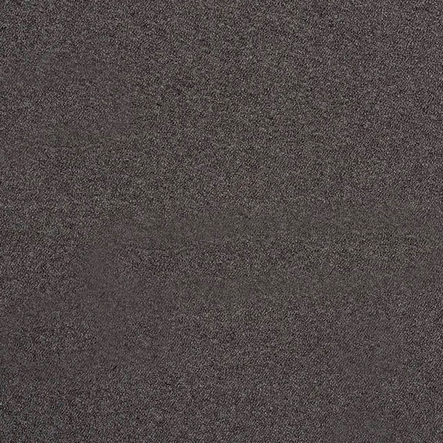Close-up of deep charcoal grey boucle fabric with fine speckled texture