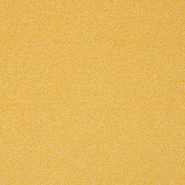 Close-up of bright chartreuse boucle fabric with fine nubby texture