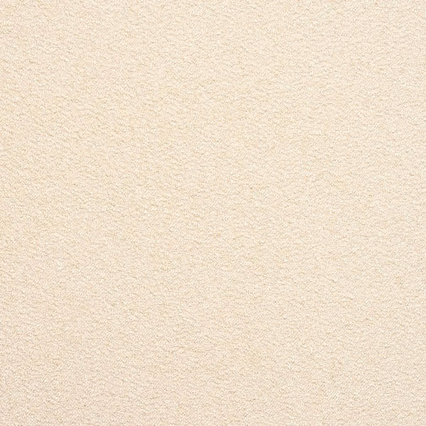 Close-up of warm natural cream boucle fabric with a softly nubby texture