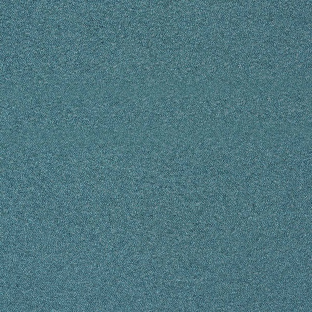 Close-up of muted teal boucle fabric with a fine, even textured surface