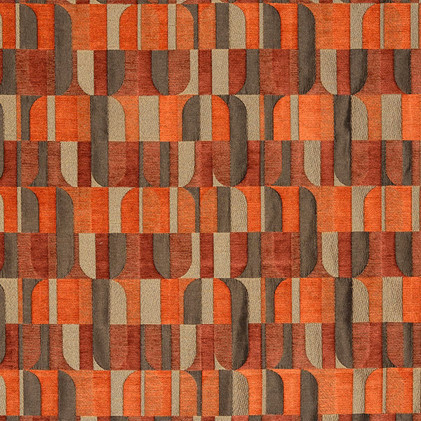 Geometric woven fabric in burnt orange, rust, taupe and brown blocks
