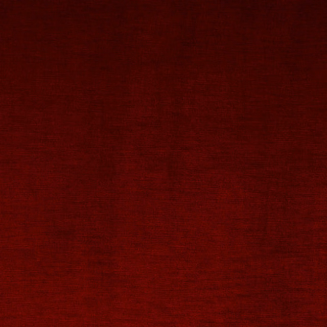 Deep burnt sienna red plain weave fabric with subtle horizontal texture