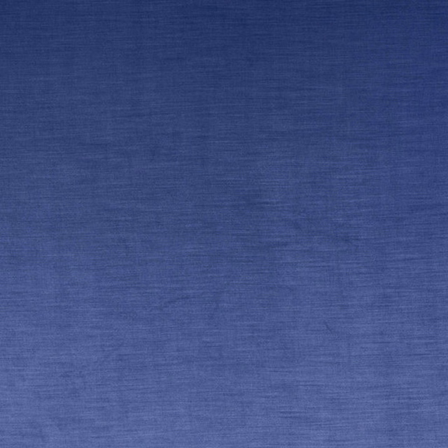 Blue plain-weave fabric swatch with soft mottled texture