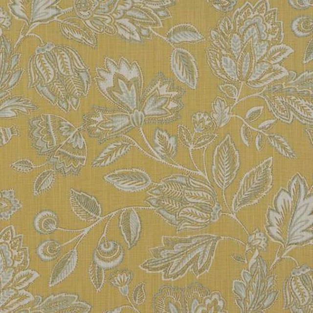 Ochre floral cotton fabric with pale leaf motifs and a woven texture