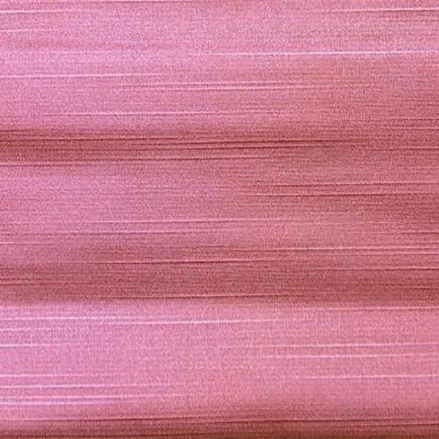 Close-up of vivid fuchsia pink fabric with fine horizontal striations