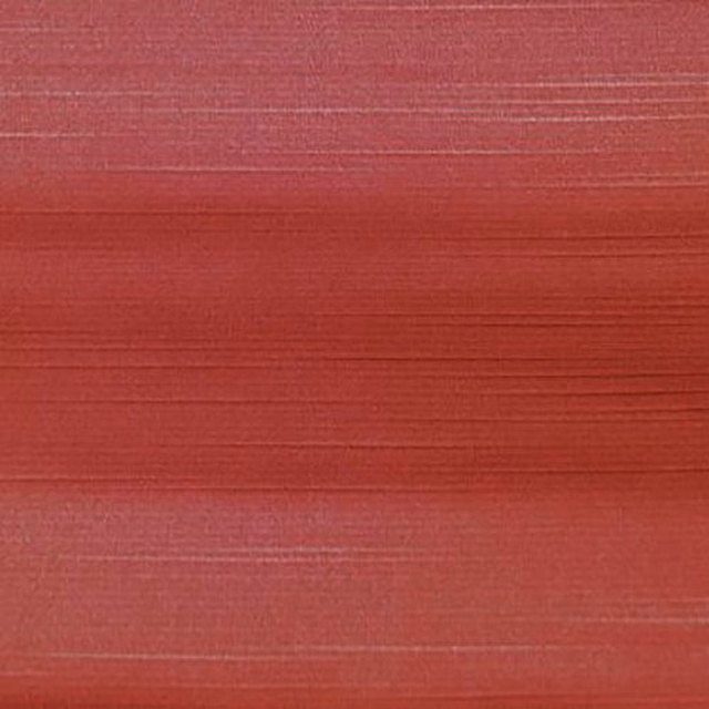 Warm red fabric swatch with fine horizontal striations and a smooth weave