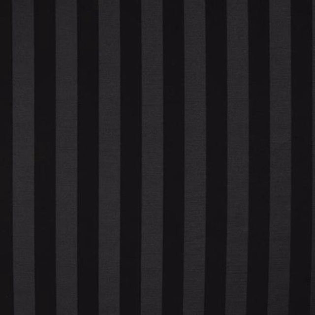 Dark vertical black and charcoal striped fabric with a matte woven texture