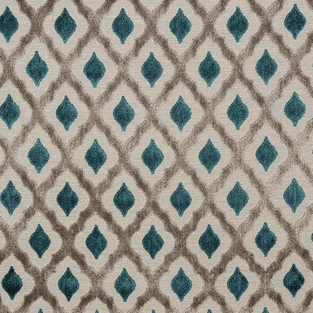 Teal diamond motif woven on a warm stone ground, close-up swatch