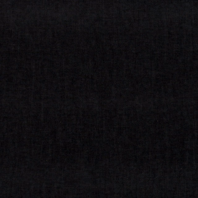 Close-up of a soft charcoal-black woven fabric with a subtle plain texture