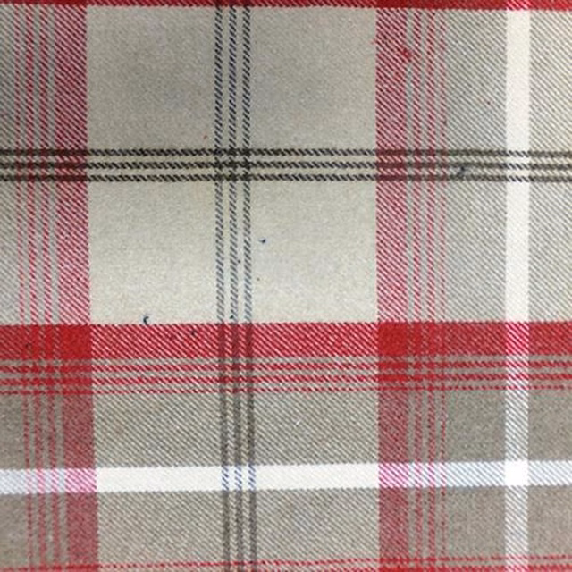 Cranberry red and stone tartan-style check fabric with woven texture