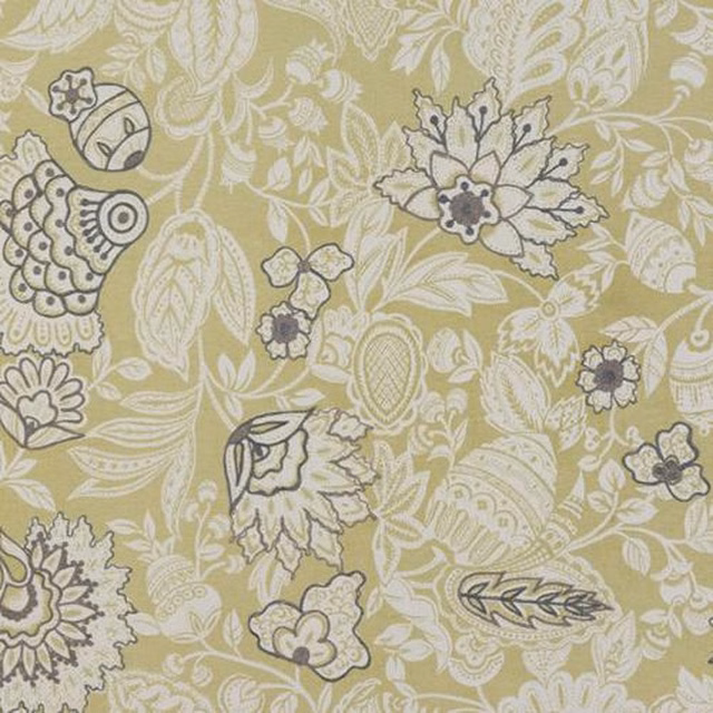 Ochre floral cotton fabric with ivory leaves and charcoal outline