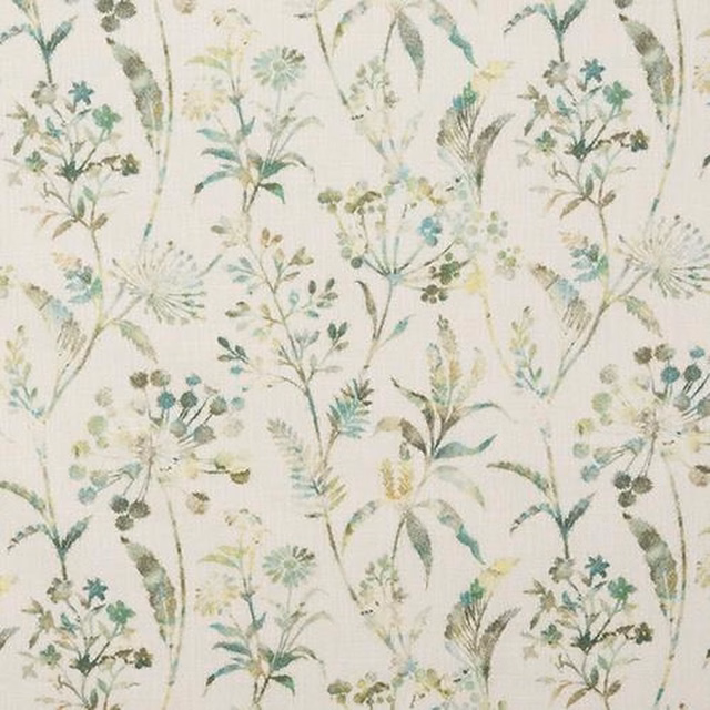 Pale floral fabric with soft teal and sage botanical sprays on an ivory ground