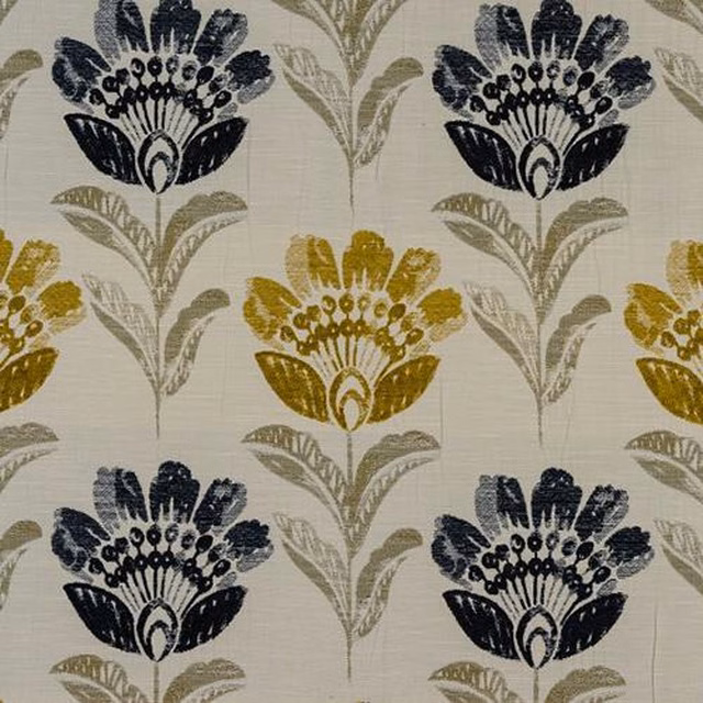 Textured floral damask fabric with indigo and mustard motifs on a pale ground