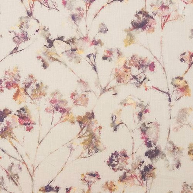 Ivory cotton fabric with scattered heathered floral stems in mauve, pink, ochre and plum