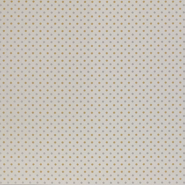 Pale ivory fabric with small evenly spaced ochre polka dots