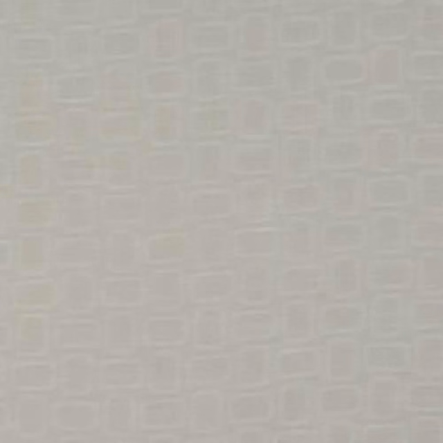 Pale ivory cotton fabric with a subtle tonal square geometric weave