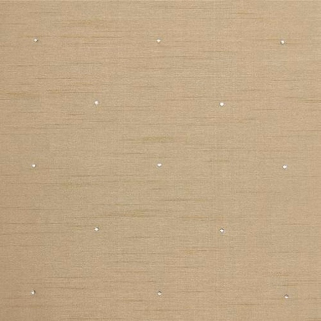 Soft warm cream fabric with tiny spaced dot motif and subtle horizontal sheen