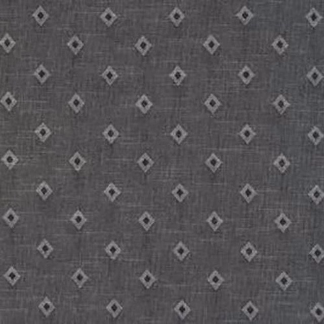 Charcoal grey cotton fabric with small diamond motifs and pale accents