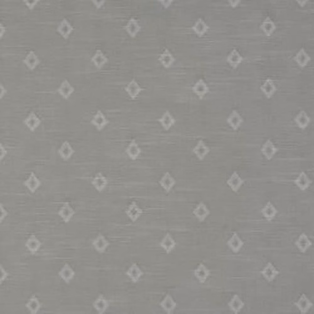 Soft dove grey cotton fabric with small repeating diamond motifs and fine woven texture