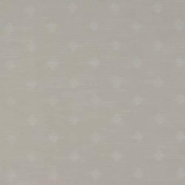 Pale ivory cotton fabric with a subtle diamond weave and soft textured ground