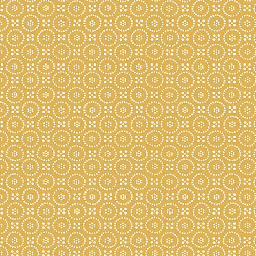 Ochre cotton fabric with small cream dotted circle motif