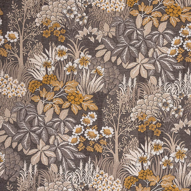 Dense floral woodland fabric in warm taupe, ochre and cream on a dark ground