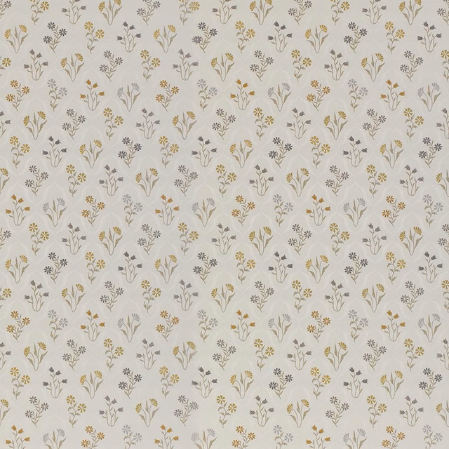 Cream floral fabric with small ochre and grey sprigs on a pale ground