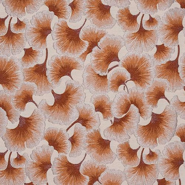 Cream fabric with repeating burnt orange gingko leaf fans and soft peach detailing