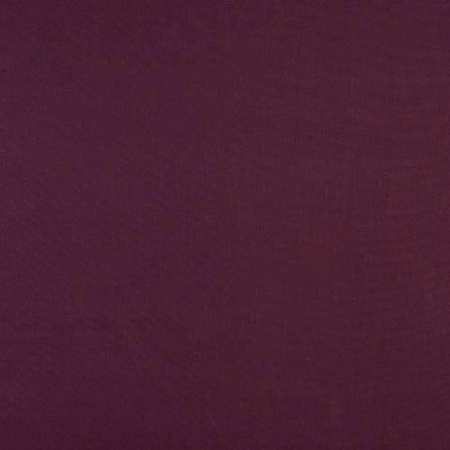 Solid deep aubergine purple cotton swatch with a smooth plain weave