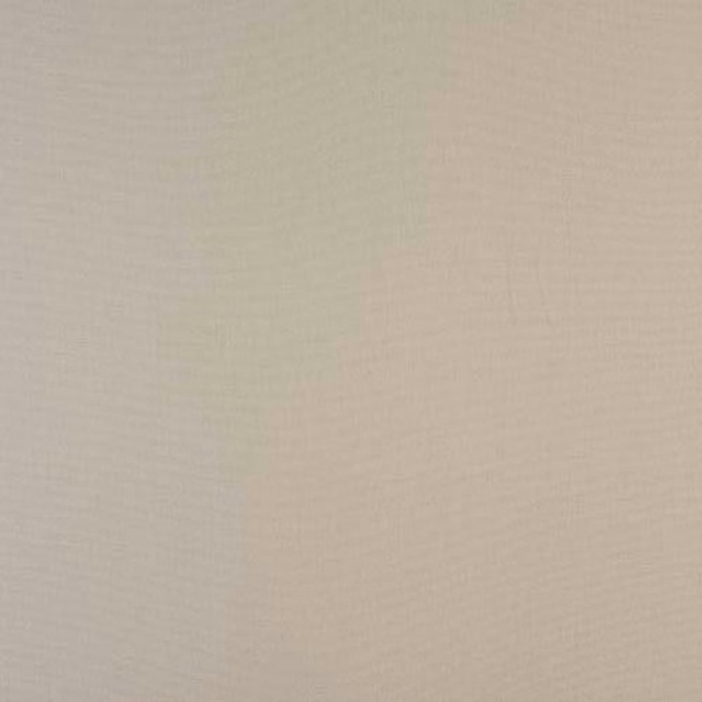 Soft warm taupe plain cotton fabric swatch with a smooth matte weave