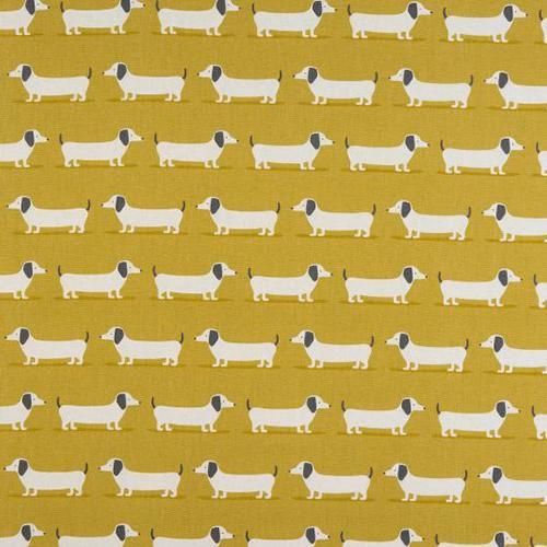 Rows of white dachshund motifs on a muted ochre cotton ground